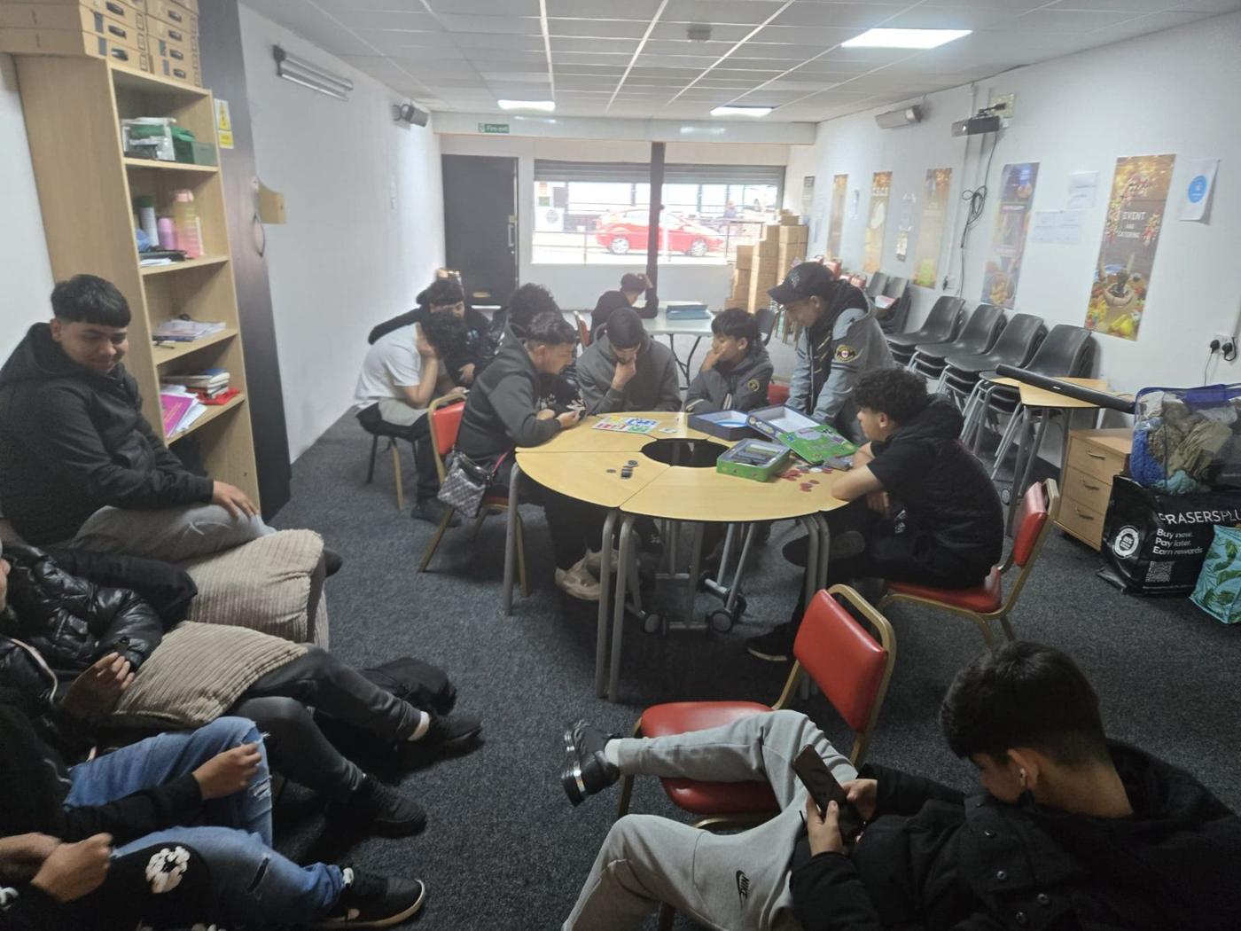 A community group meeting around a table in Gateshead