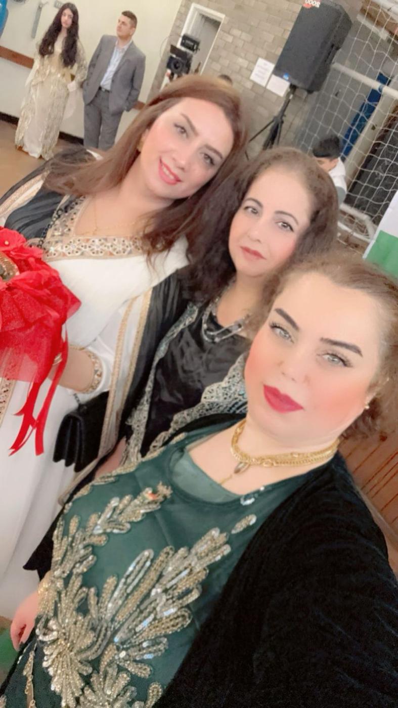 Women from a community group at a celebration