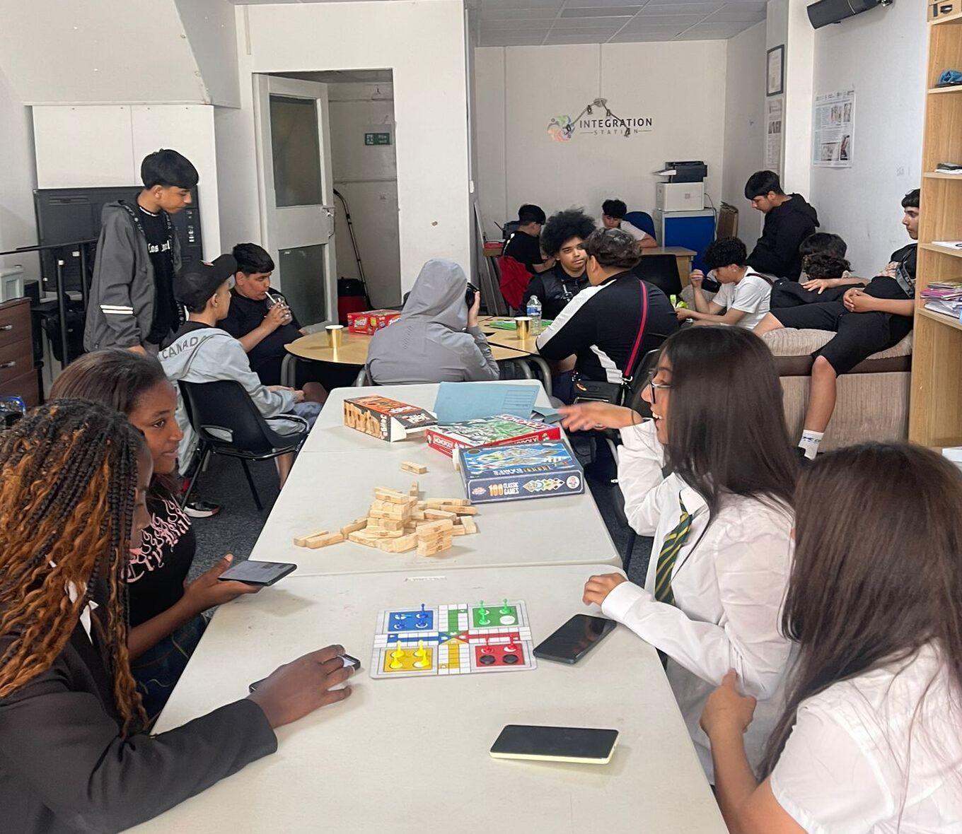 Young people playing games at the Youth Club