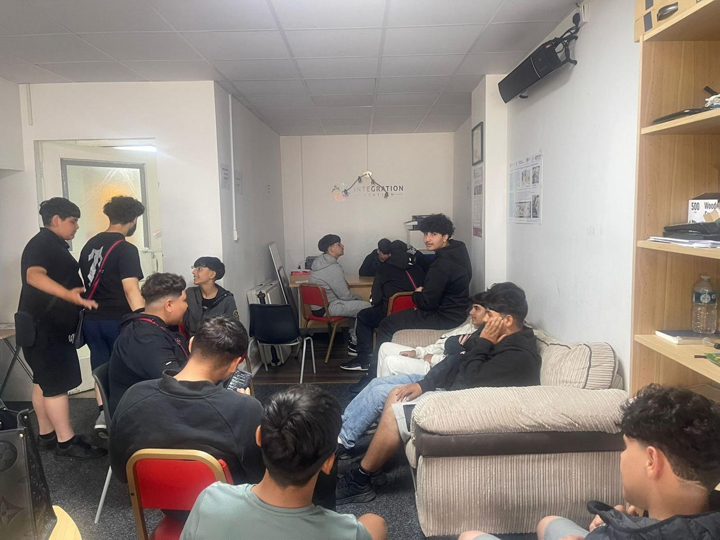 Young people relaxing at the Youth Club