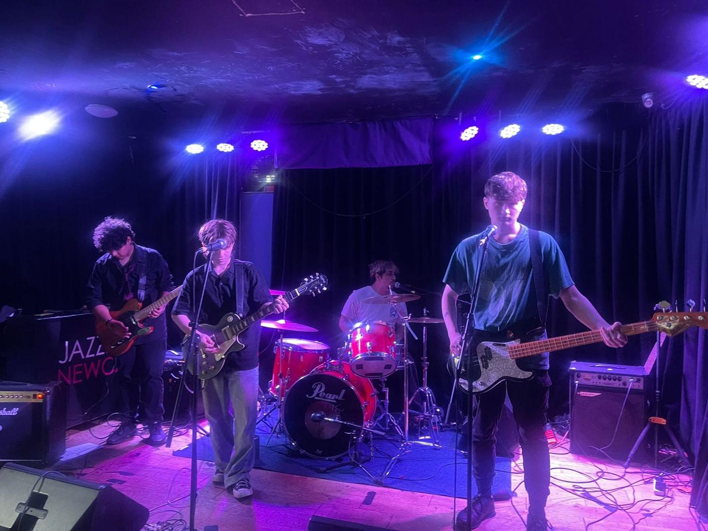 Young people performing live music at the Youth Club